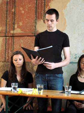 Lecturing young man in the synagogue