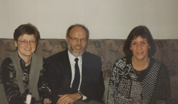 Three people on a sofa